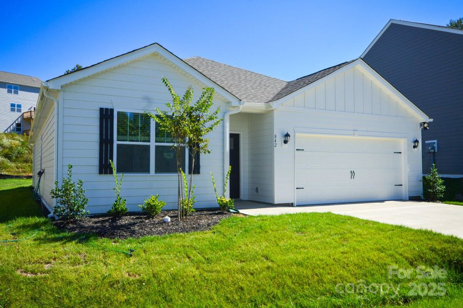 Exterior details and patio area of a home in Rydele Heights, Asheville (Image 2). Exterior details and patio area of a home in Rydele Heights, Asheville (Image 2).