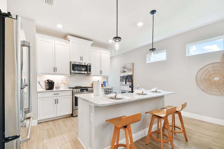 Representative furnished interior of a home built from the Sandpiper by William Ryan Homes in Fairway Pointe - Villa Community, Sun City Center (Image 15).