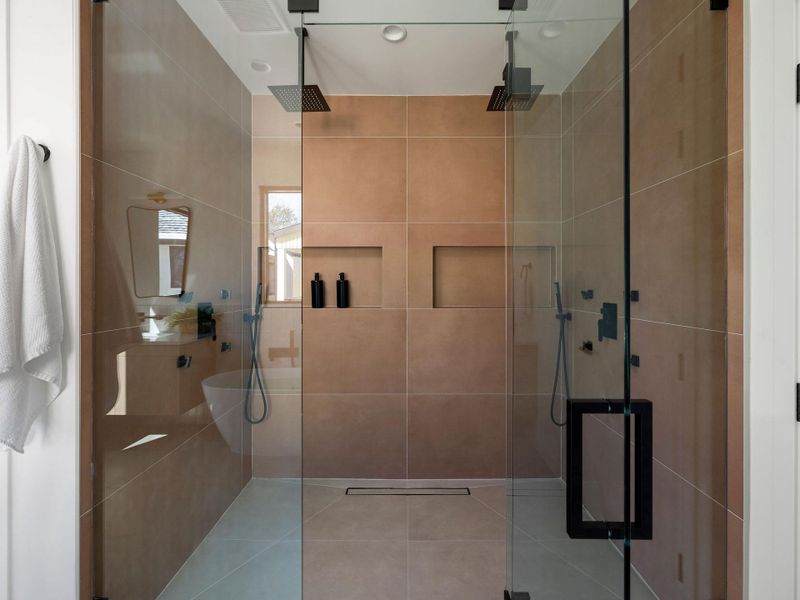 Bathroom featuring a shower stall