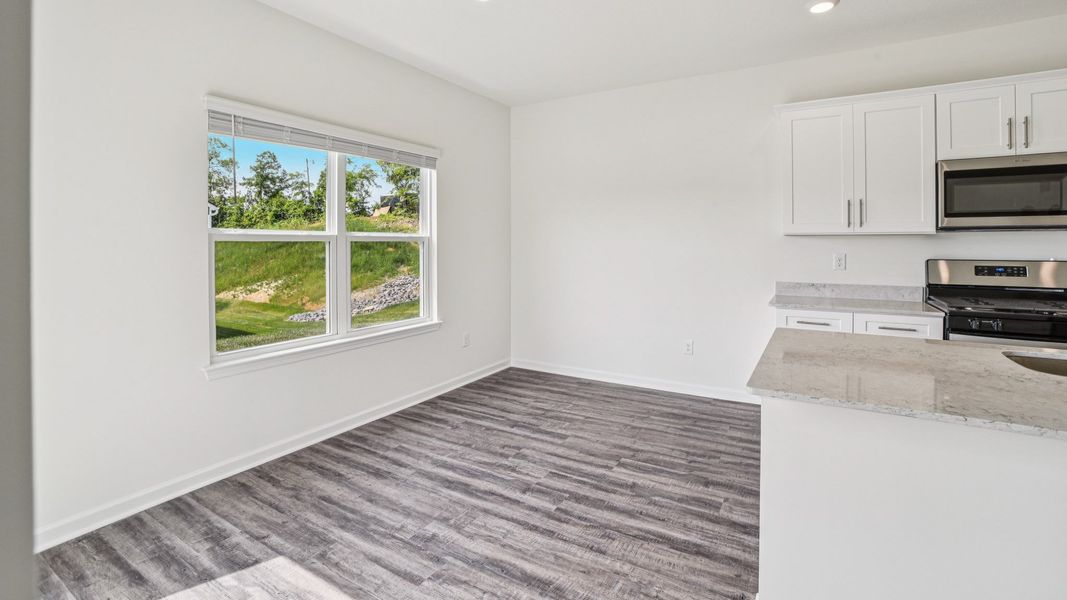 Representative unfurnished interior of a home built from the Craig by D.R. Horton in The Hideaway at Fox Meadows, Bluff City (Image 15).
