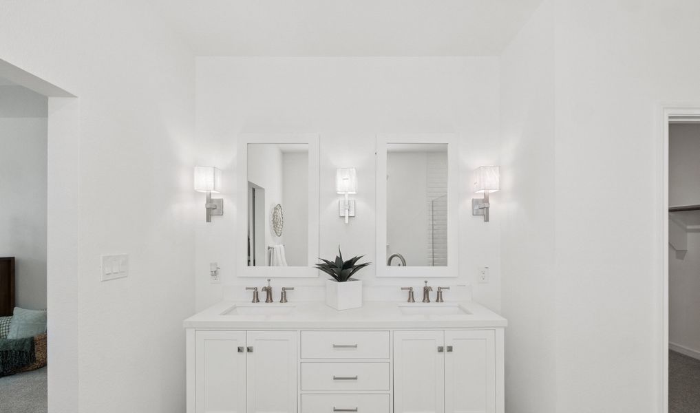 Primary bath features freestanding vanity with dual sinks Primary bath features freestanding vanity with dual sinks