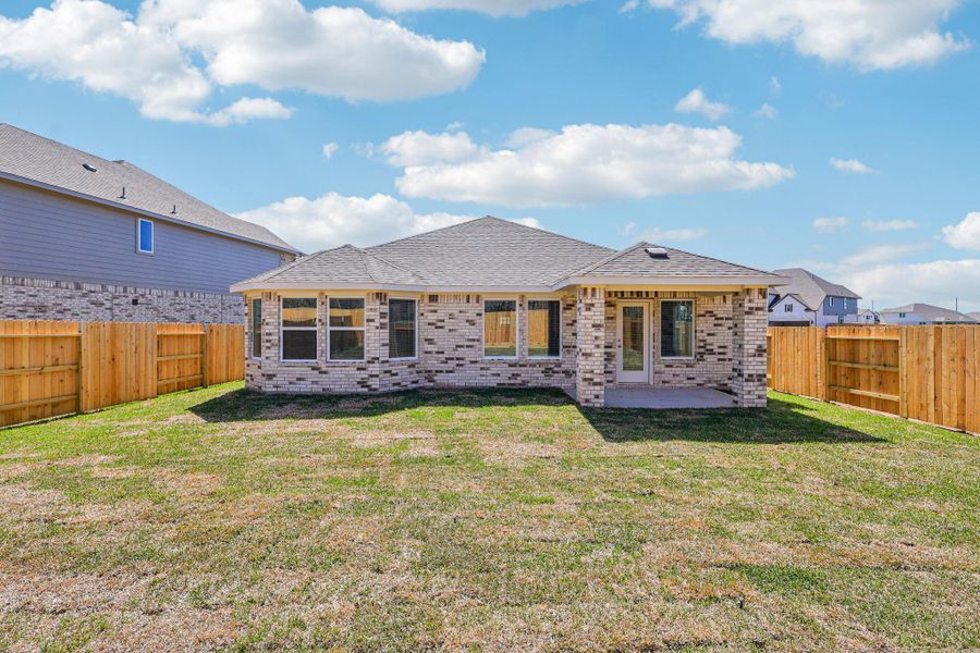Exterior details and patio area of a home in Kingdom Heights, Rosenberg (Image 24).