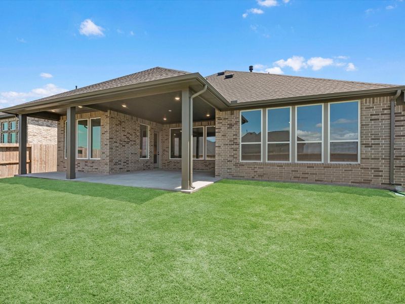 Exterior details and patio area of a home in Pecan Ridge, Fulshear (Image 4). Exterior details and patio area of a home in Pecan Ridge, Fulshear (Image 4).