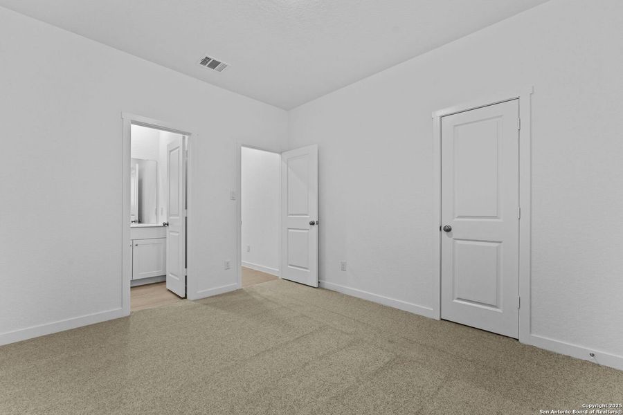 Spacious, unfurnished interior of a new home in Waterwheel: Coastline Collection, San Antonio (Image 19).