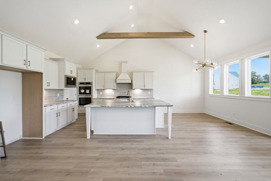 Furnished interior view inside a new home in Aden Woods, Fairview (Image 7).