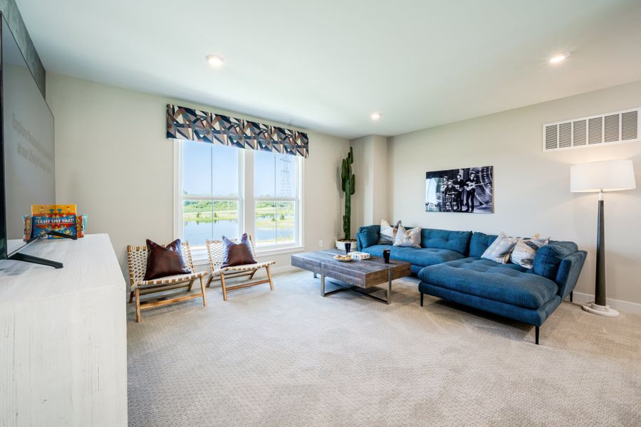 Representative furnished interior of a home built from the Leland by Fischer Homes in Hidden Fields, Hoschton (Image 23).
