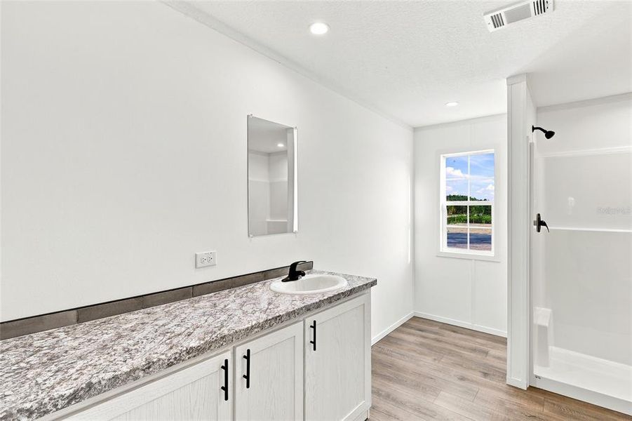 Furnished interior view inside a new home in , Okeechobee (Image 8).