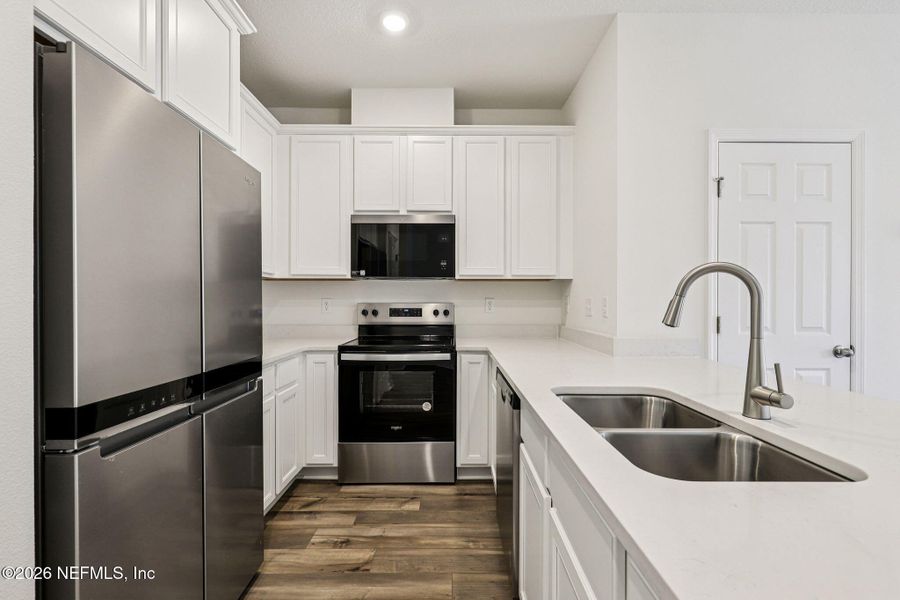 Furnished interior view inside a new home in Orchard Park Townhomes, St. Augustine (Image 12). Furnished interior view inside a new home in Orchard Park Townhomes, St. Augustine (Image 12).