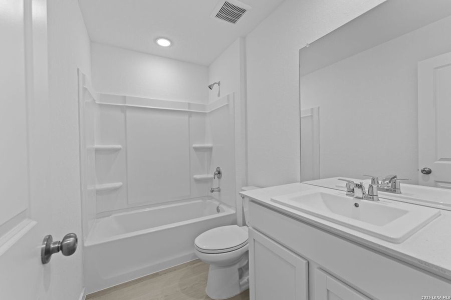 Furnished interior view inside a new home in Higdon Crossing, San Antonio (Image 9).
