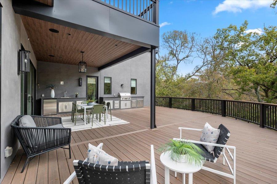 The outdoor deck is built with TimberTech's sustainable decking to endure beautifully over time.