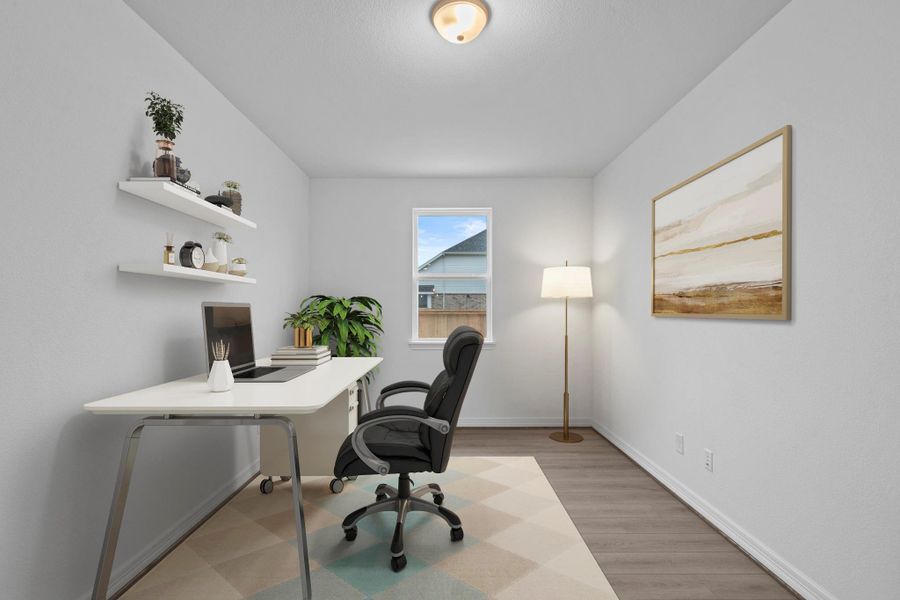 The home office features French doors, beautiful floors, large windows that give a fresh feel, this space promotes focus and creativity.