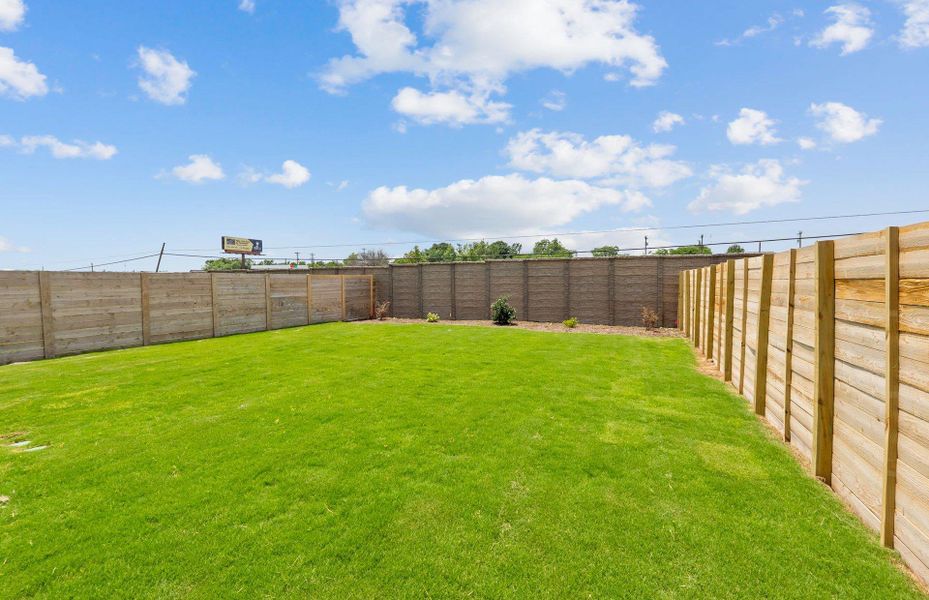 Front exterior of a new home in Horizon Lake, Leander, TX, highlighting curb appeal (Image 1). Front exterior of a new home in Horizon Lake, Leander, TX, highlighting curb appeal (Image 1).