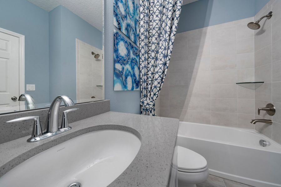 Representative furnished interior of a home built from the Miles by Risewell Homes in Harrell Oaks, Orlando (Image 15).