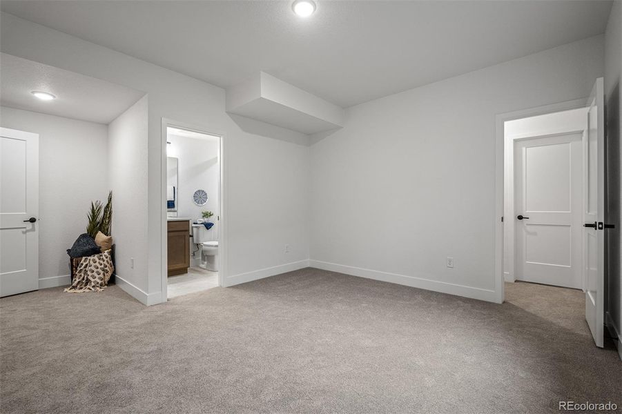 Spacious, unfurnished interior of a new home in Wolf Ranch - Enclave Collection, Colorado Springs (Image 29).