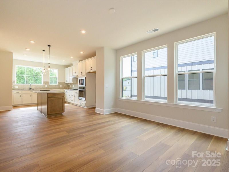 Dining Space Highlighted by Large Energy Efficient Windows.