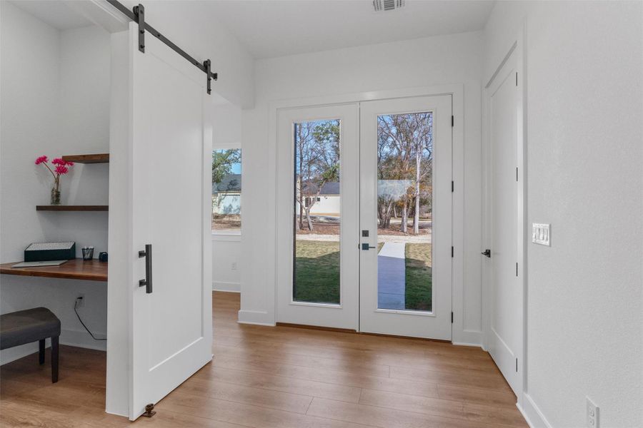 A light-filled front entry that sets the tone, clean lines, warm floors, and a welcoming first impression. A light-filled front entry that sets the tone, clean lines, warm floors, and a welcoming first impression.