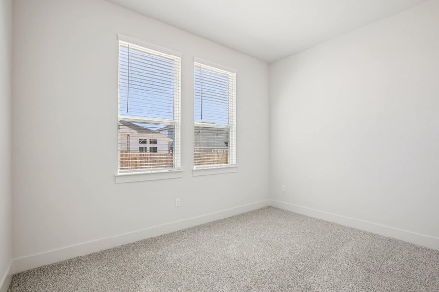 Representative unfurnished interior of a home built from the Draco by Chesmar Homes in The Grove at Blackhawk, Pflugerville (Image 15).