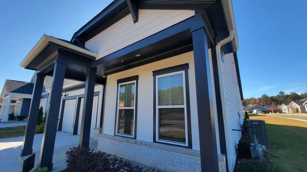 Exterior details and patio area of a home in The Reserve at Bells Ferry, Kennesaw (Image 27).