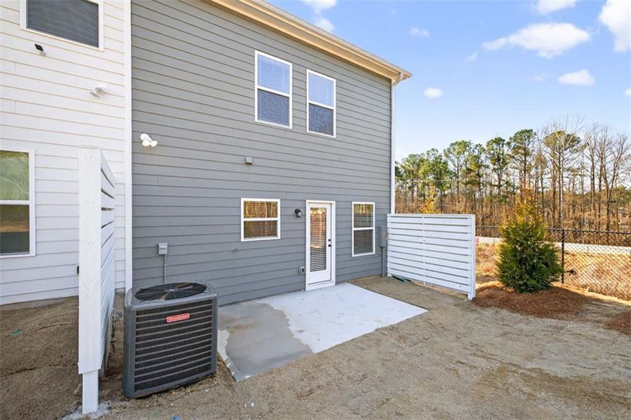 Exterior details and patio area of a home in Fuller Station, Loganville (Image 3).