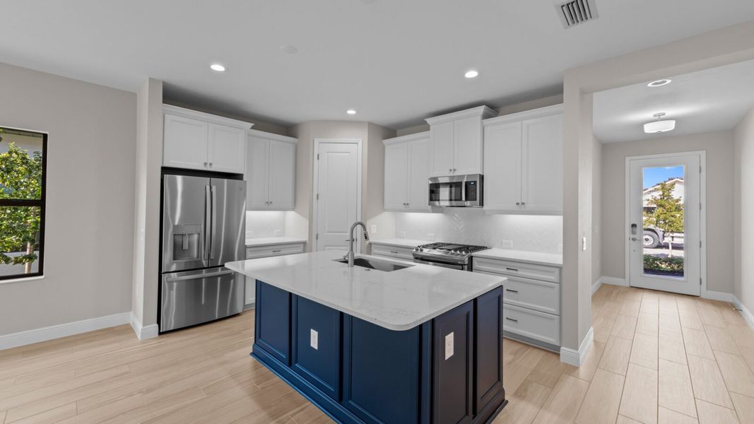 Furnished interior view inside a new home in SkySail, Naples (Image 6).