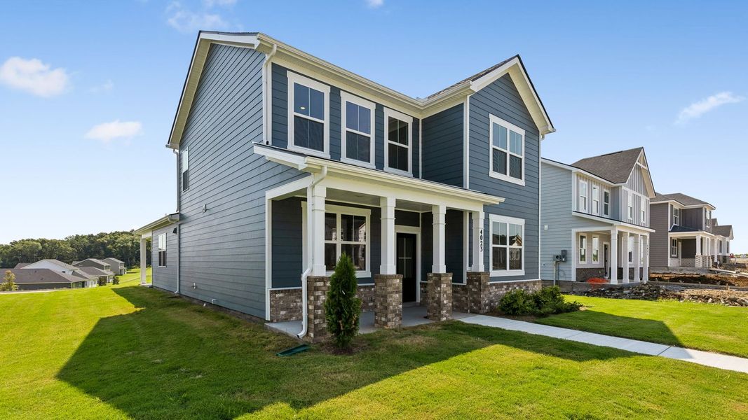 Front exterior of a new home in Reserve at Hickory Ridge, Columbia, TN, highlighting curb appeal (Image 26).