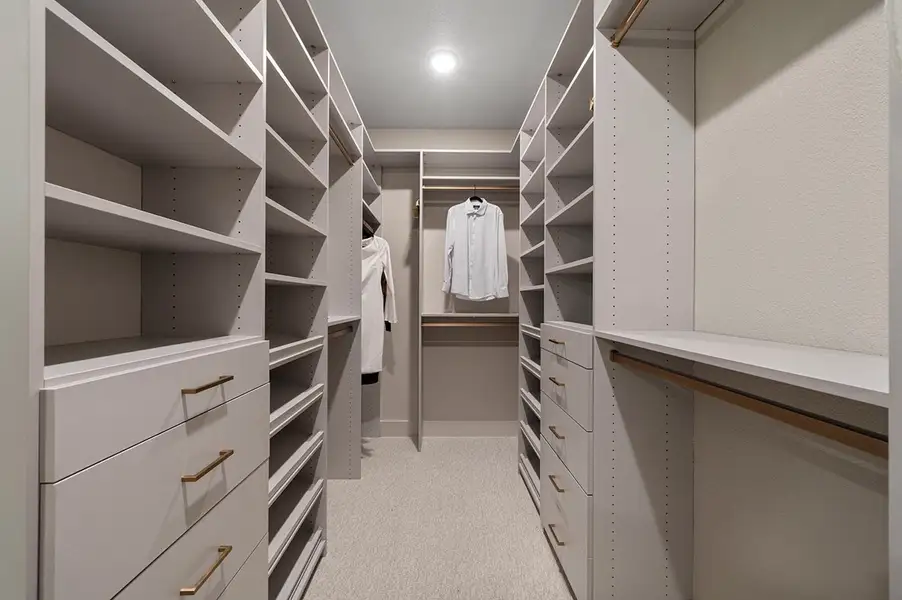 Furnished interior view inside a new home in The Highlands 50', Porter (Image 28).