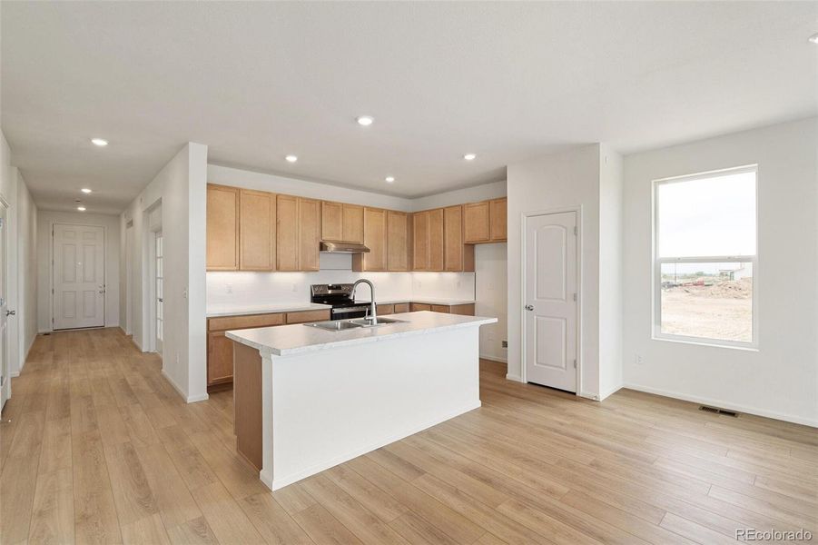 Furnished interior view inside a new home in Turnberry, Commerce City (Image 3).