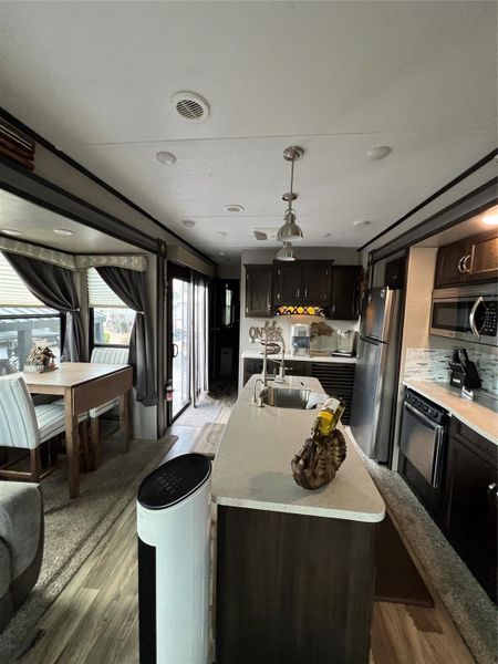 Furnished interior view inside a new home in , Okeechobee (Image 9).