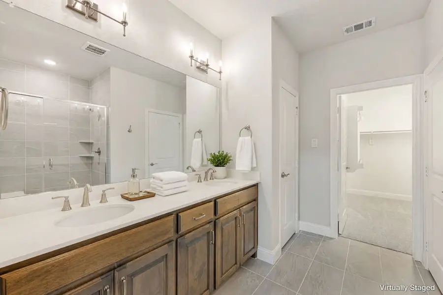 Furnished interior view inside a new home in Cottonwood Creek, Rowlett (Image 37).