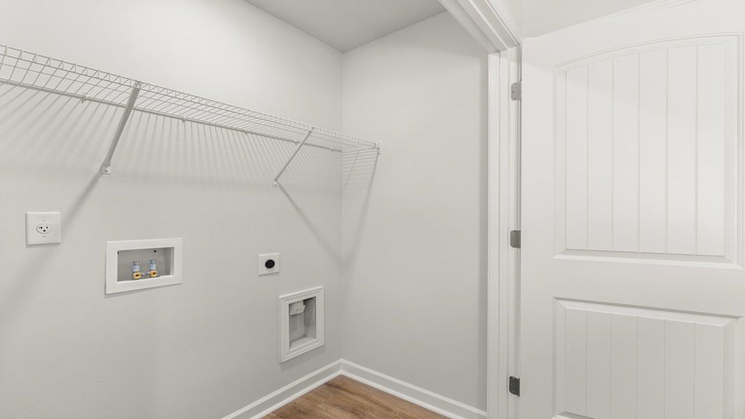 Representative furnished interior of a home built from the ADDINGTON by D.R. Horton in Waypoint, Flowery Branch (Image 32).