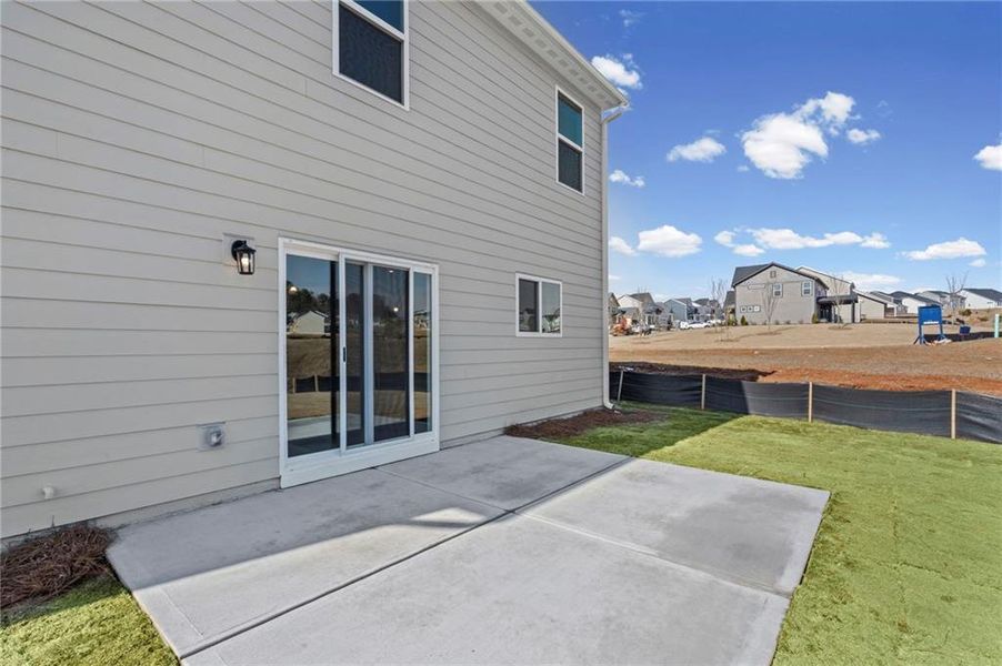 Exterior details and patio area of a home in Twin Lakes, Hoschton (Image 23).
