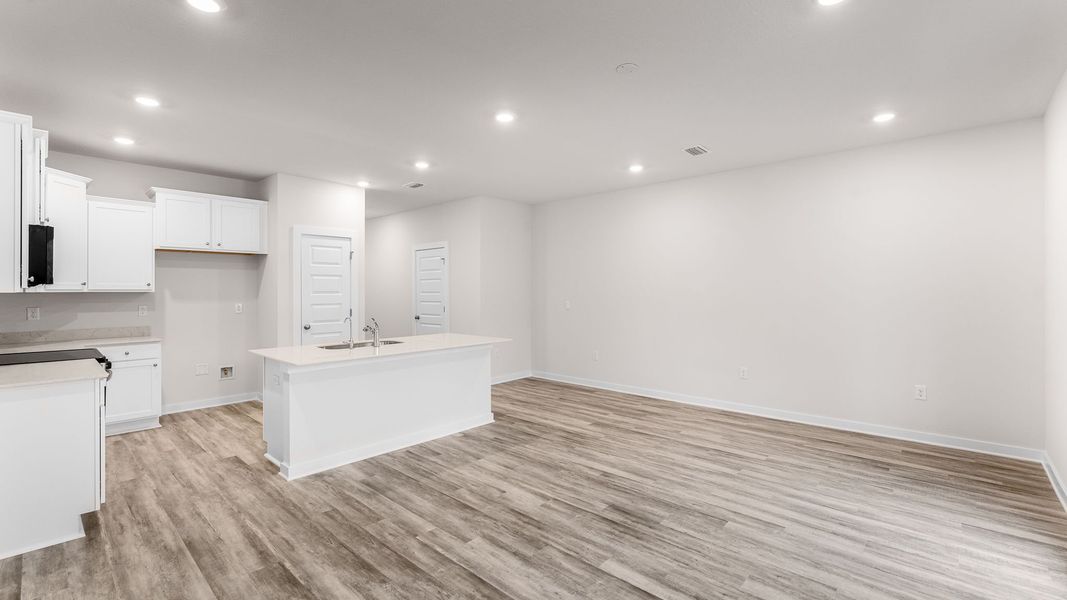 Representative unfurnished interior of a home built from the Palm Interior by D.R. Horton in Genoa Landing Townhomes, Freeport (Image 17).