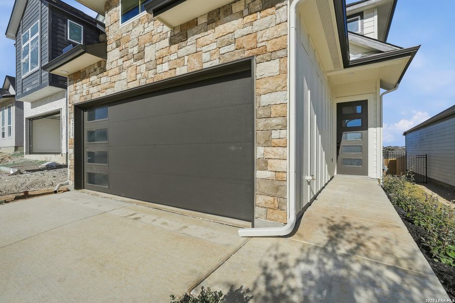 Exterior details and patio area of a home in Prominence, San Antonio (Image 4).