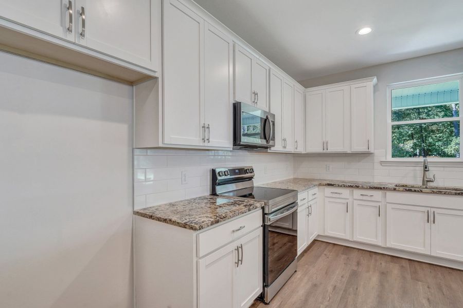 Furnished interior view inside a new home in Settlers Hammock, Kingsland (Image 8).