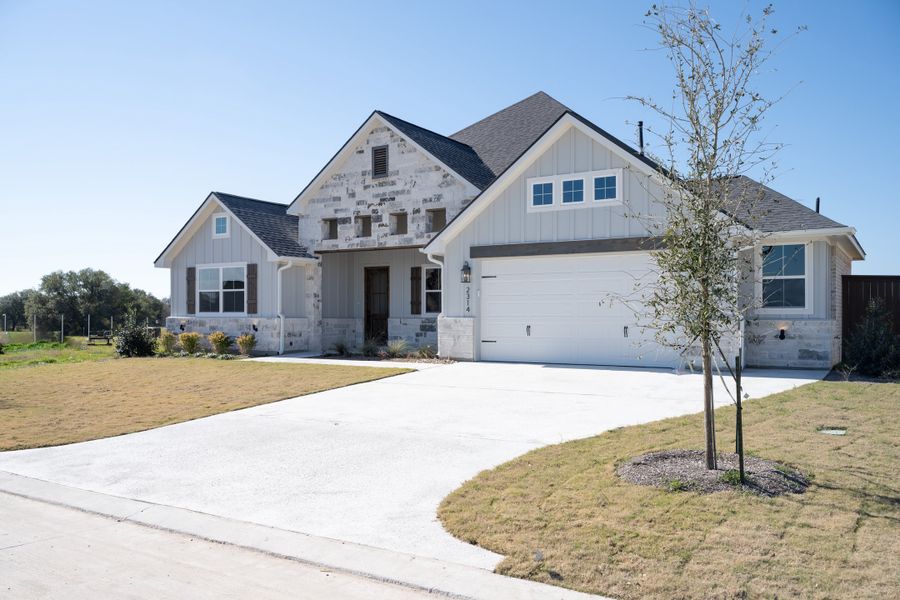 Representative exterior photo of a completed home built from the The Addison by Reece Homes in Pebble Creek, College Station, TX (Image 30).