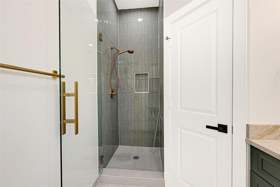 Tile to ceiling Shower with glass door