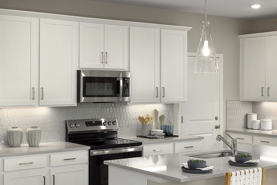 Maple framed cabinets at kitchen