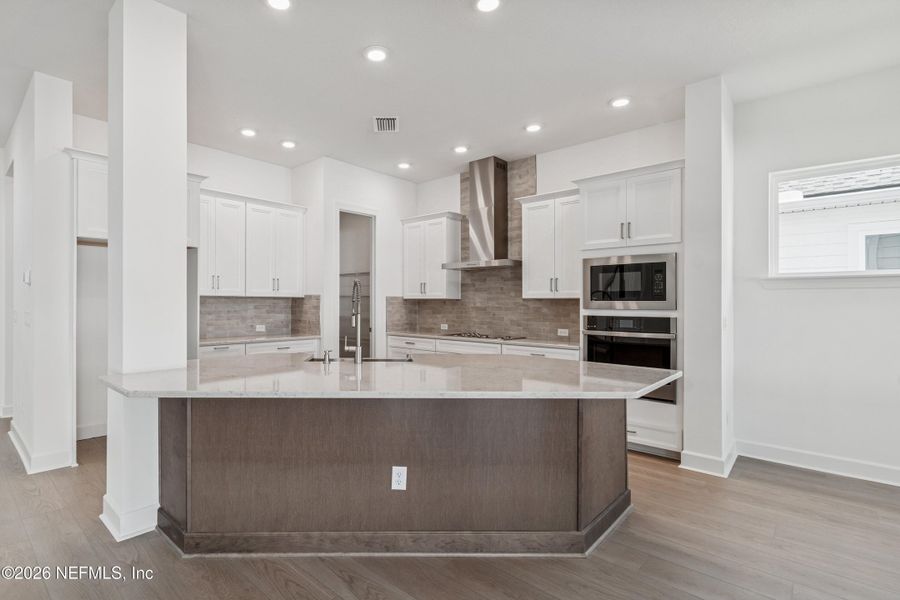 Furnished interior view inside a new home in Evergreen Island at Silverleaf - Executive, St. Augustine (Image 10).
