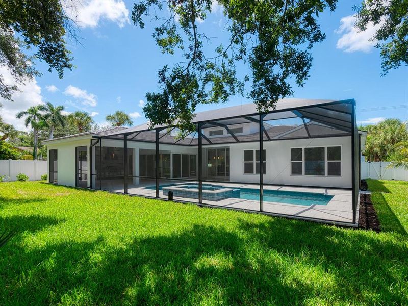 Front exterior of a new home in , Sarasota, FL, highlighting curb appeal (Image 29).