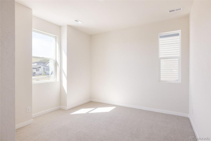 Spacious, unfurnished interior of a new home in Lyric at Ridgegate, Lone Tree (Image 20).