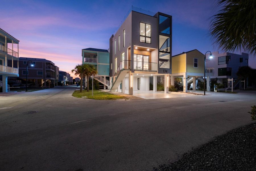 Front exterior of a new home in , Key Largo, FL, highlighting curb appeal (Image 25).