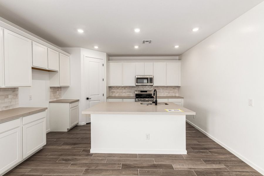 Furnished interior view inside a new home in Bella Vista Farms, San Tan Valley (Image 3).