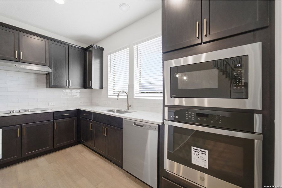 Furnished interior view inside a new home in Megan's Landing, Castroville (Image 13).