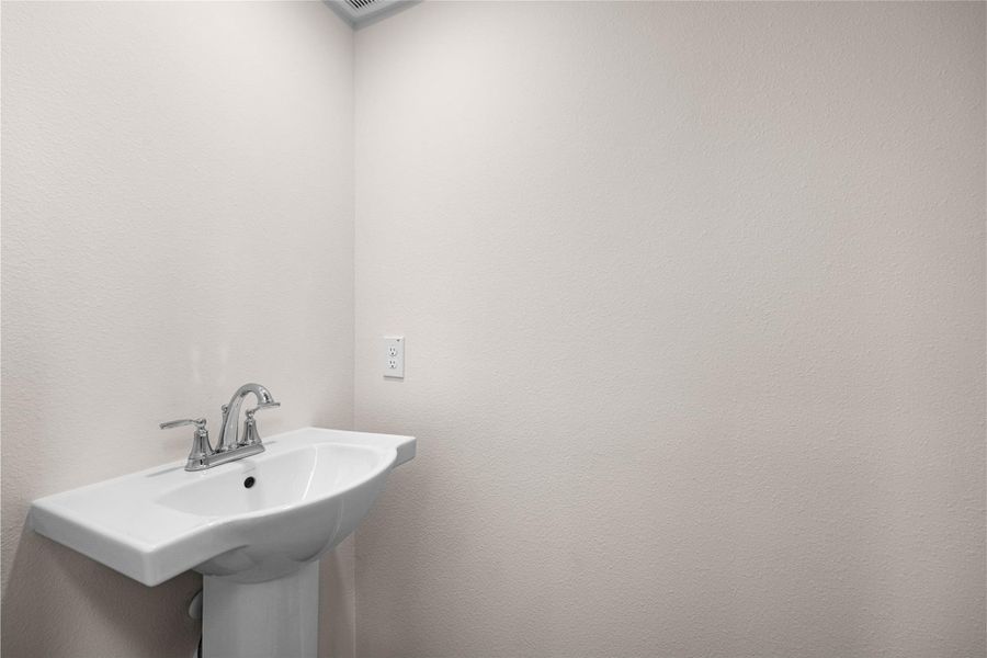 Close-up of interior finishes inside a home in Creekhaven, Iowa Colony (Image 13).