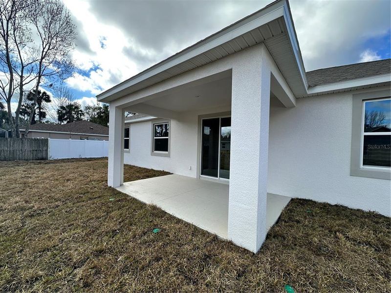 Exterior details and patio area of a home in Palm Coast: Cornerstone Collection, Palm Coast (Image 3).