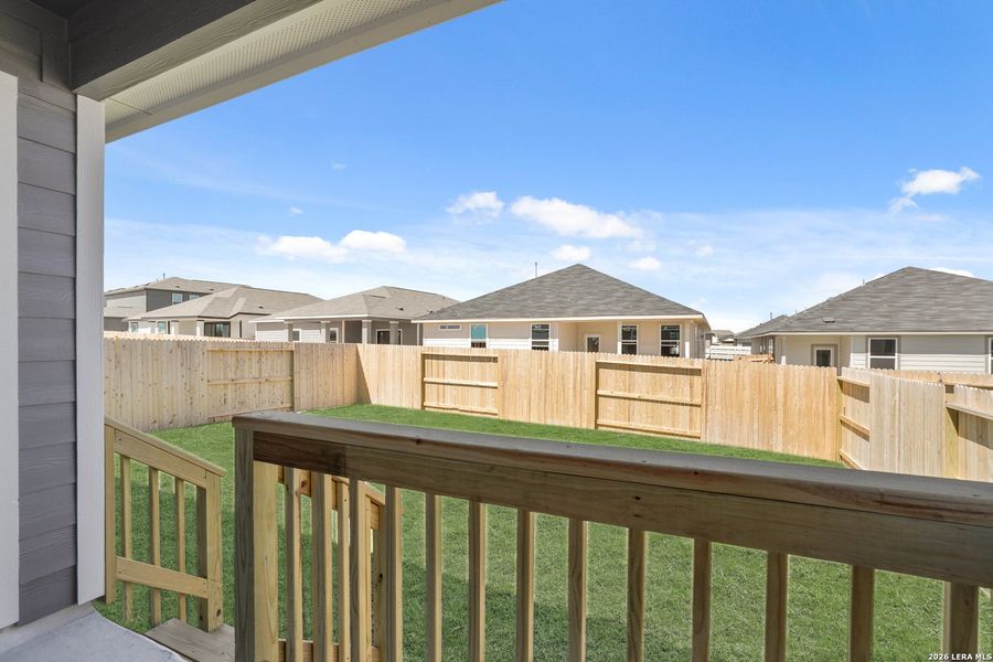 Exterior details and patio area of a home in Hickory Ridge, Elmendorf (Image 3).
