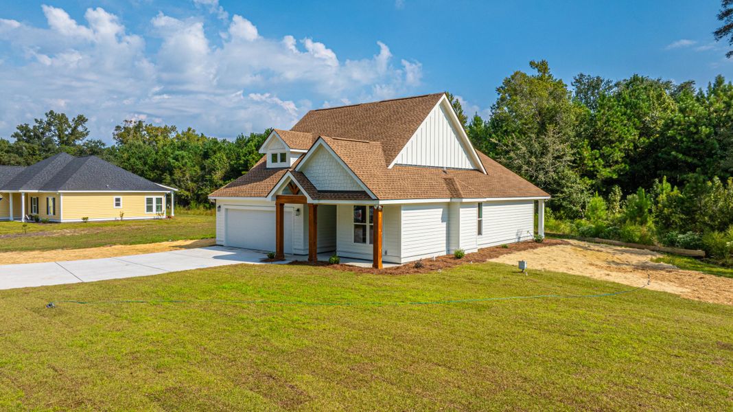 Front exterior of a new home in , McClellanville, SC, highlighting curb appeal (Image 24).