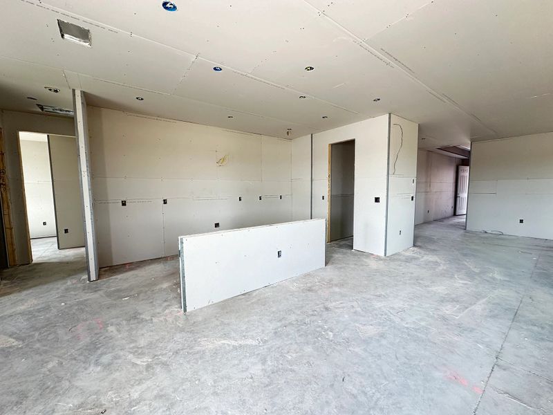 Kitchen located just off the living and dining spaces which will feature AW Collection® Harmony - under construction