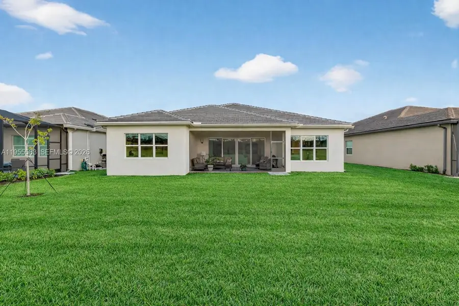 Exterior details and patio area of a home in , Port St. Lucie (Image 22).