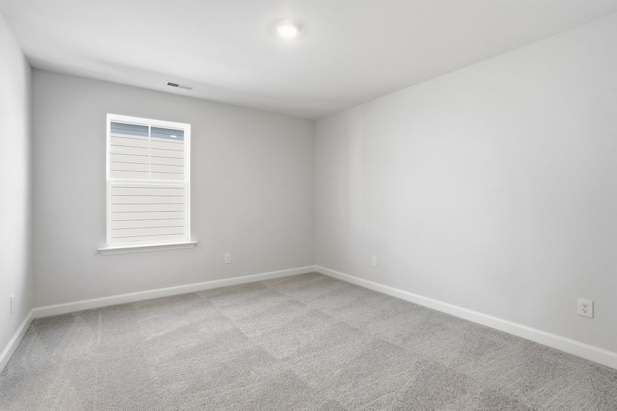 Spacious, unfurnished interior of a new home in Sweetbrier, Durham (Image 42).